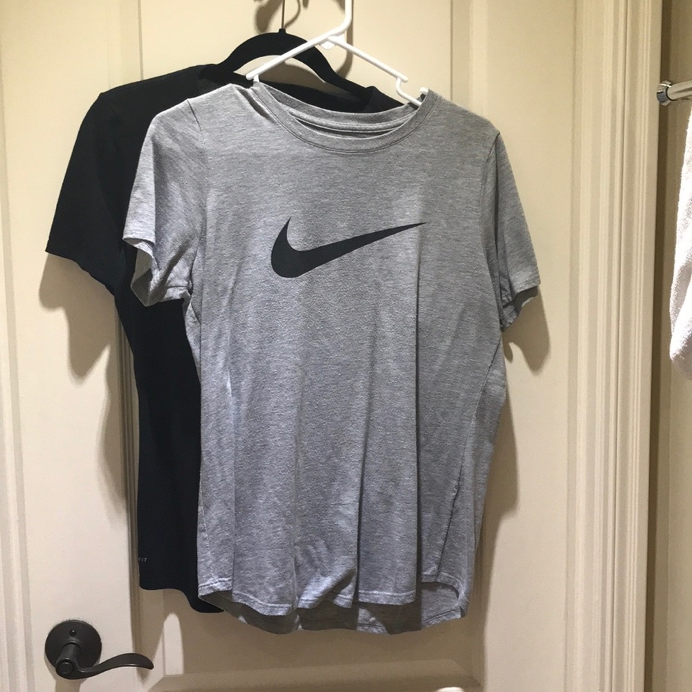 Two Women’s Nike Dri-Fit Tees.